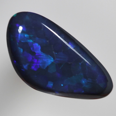 SOLID BLACK OPAL Flags of bright turquoise over royal blue